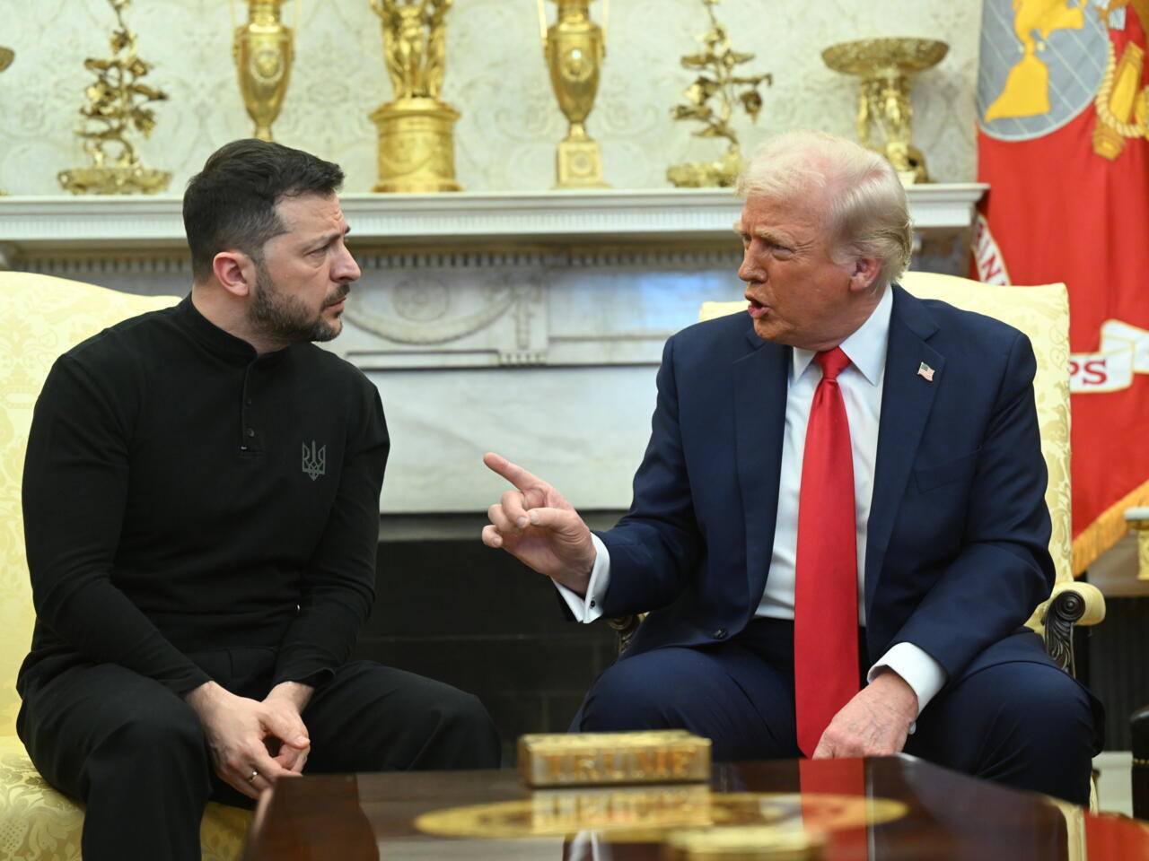 Donald Trump and Volodymyr Zelensky during a diplomatic meeting amid tensions over US support for Ukraine.